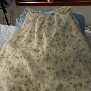 Floral blouson style tank with now at the waist. Worm one time for pictures.